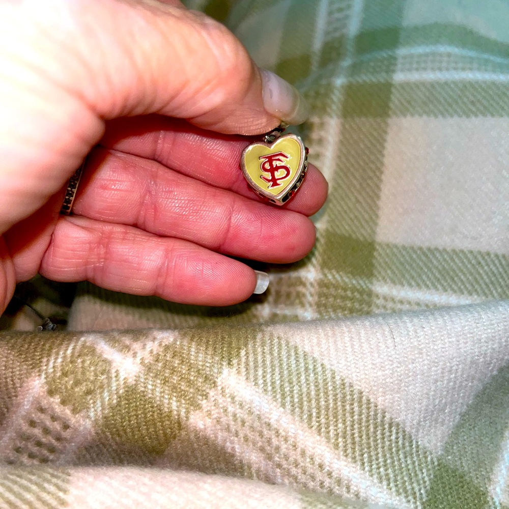 FSU garnet & gold heart cabochon.
